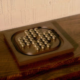 Solitaire in Brass & American Walnut by Ashley Corbett-Smith