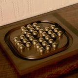 Solitaire in Brass & American Walnut by Ashley Corbett-Smith